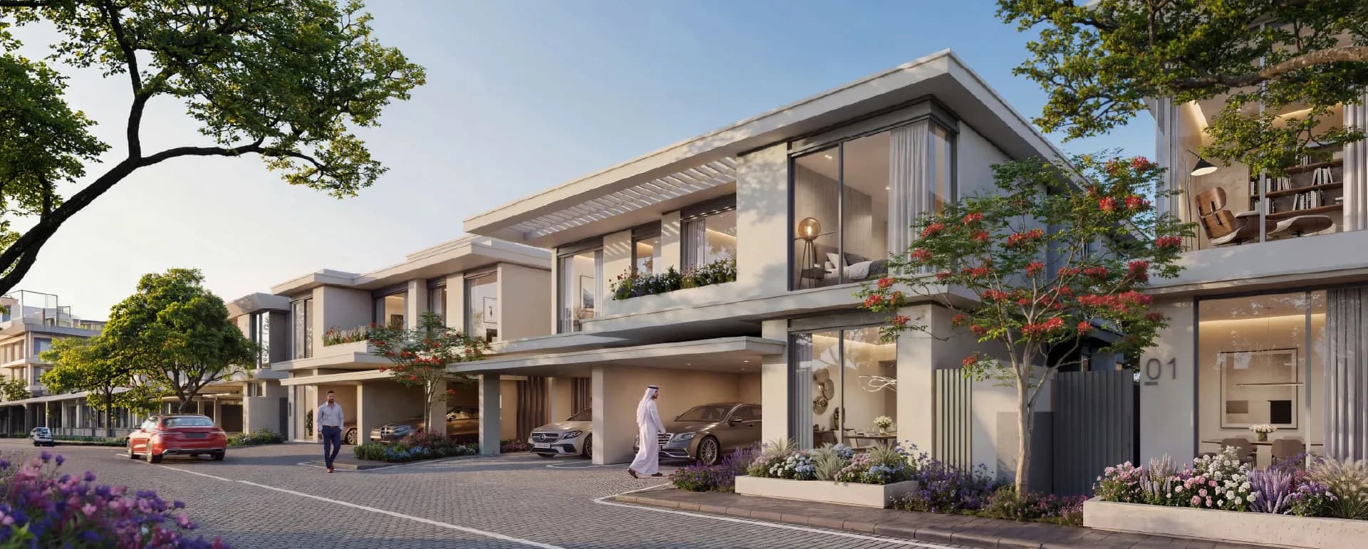 Azizi Florence townhouses along a landscaped residential street